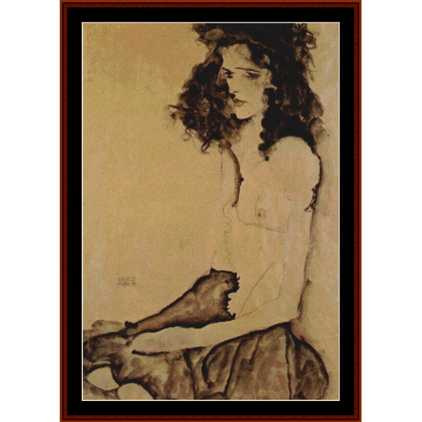 Counted Cross Stitch Pattern by Cross Stitch Collectibles of a nude figure with a brown frame