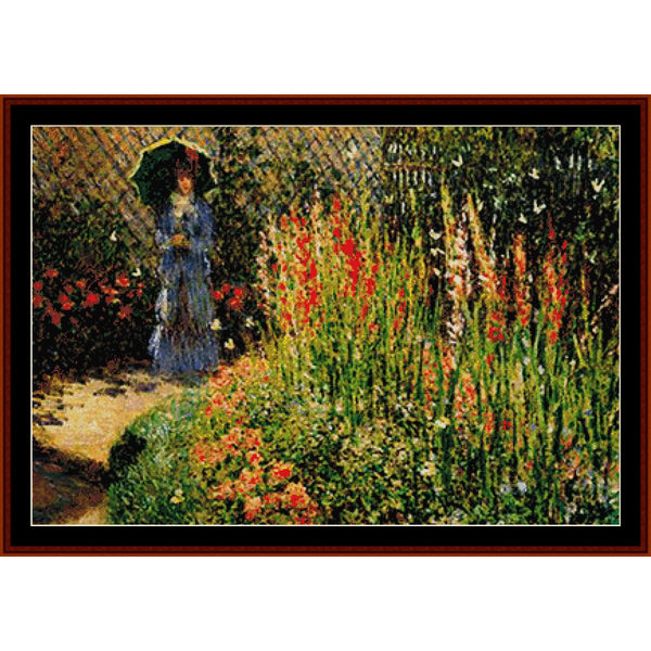 Counted Cross Stitch Pattern by Cross Stitch Collectibles of a woman in a garden with flowers and butterflies