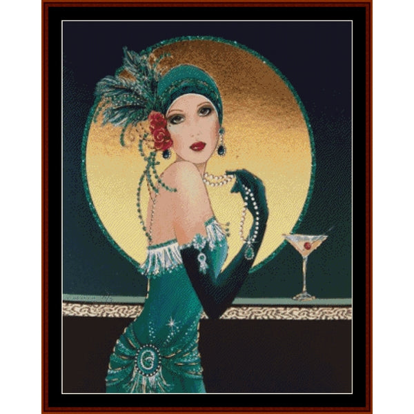 Art Deco-style Counted Cross Stitch Pattern by Cross Stitch Collectibles of a woman in a teal dress with a cocktail, framed in brown.