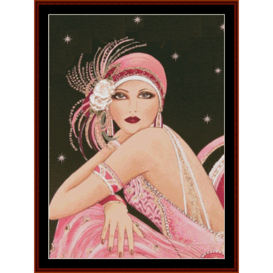 Art Deco-style Counted Cross Stitch Pattern by Cross Stitch Collectibles of a woman with a pink headpiece and dress against a starry night sky.