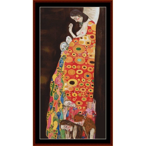 Colorful Counted Cross Stitch Pattern by Cross Stitch Collectibles of a woman with child, framed in brown.