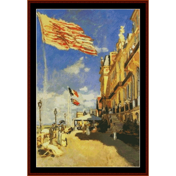 Counted Cross Stitch Pattern by Cross Stitch Collectibles of a coastal scene with flags and a hotel.