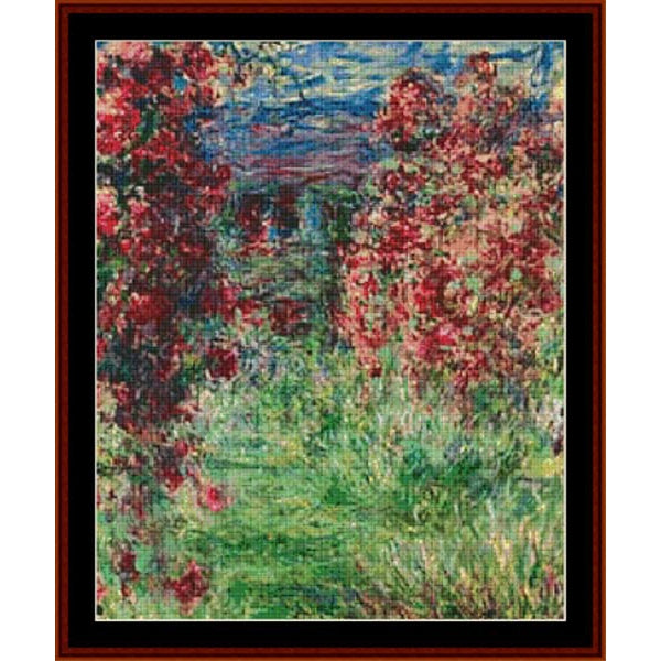 Counted Cross Stitch Pattern by Cross Stitch Collectibles of a colorful landscape with flowers and a house.