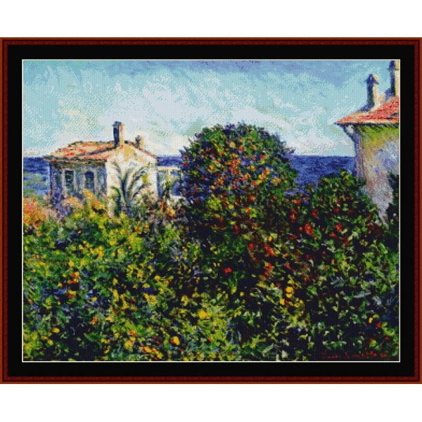 Counted Cross Stitch Pattern by Cross Stitch Collectibles of a coastal scene with houses and greenery