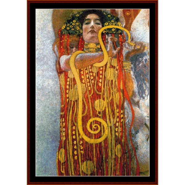 Counted Cross Stitch Pattern by Cross Stitch Collectibles of a figure with intricate patterns and vibrant colors, framed in brown.