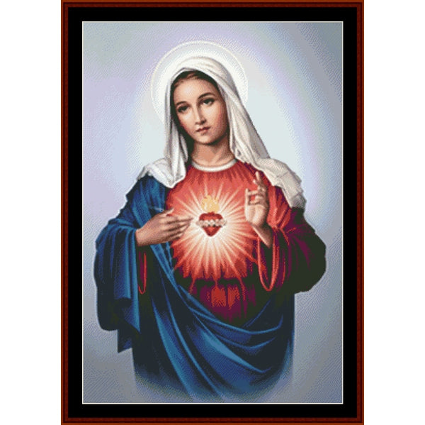 Counted Cross Stitch Pattern by Cross Stitch Collectibles of a the virgin Mary holding a radiant heart