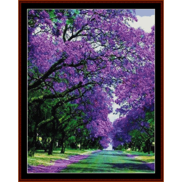 Counted Cross Stitch Pattern by Cross Stitch Collectibles of a tree with purple flowers