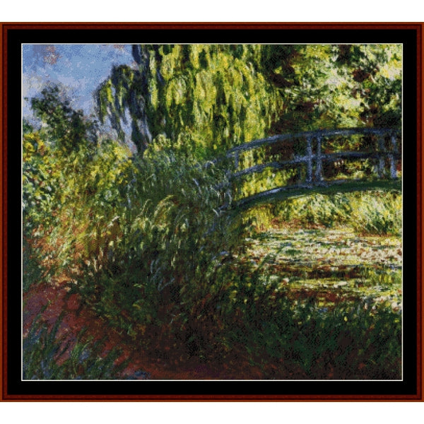 Counted Cross Stitch Pattern by Cross Stitch Collectibles of a bridge over water lilies with lush greenery