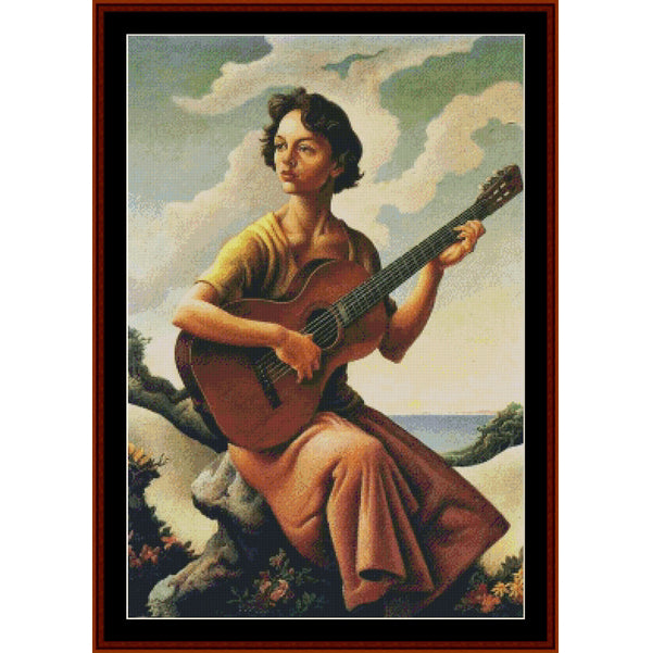 Counted Cross Stitch Pattern by Cross Stitch Collectibles - Woman playing guitar in a scenic outdoor setting with a wooden frame.