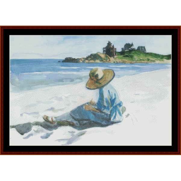 Counted Cross Stitch Pattern by Cross Stitch Collectibles of a person sitting on a beach with a lighthourse in the background
