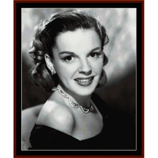 Black and white Counted Cross Stitch Pattern by Cross Stitch Collectibles of a Judy Garland with a blurred background