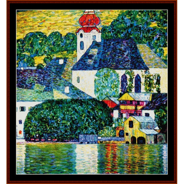 Colorful Counted Cross Stitch Pattern by Cross Stitch Collectibles of a village by a lake with a church spire.