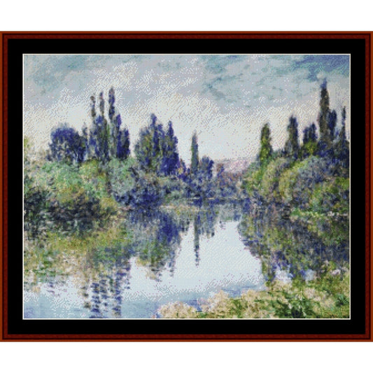 Counted Cross Stitch Pattern: Morning on the Seine VIII by Claude Monet- Cross Stitch Collectibles - Impressionist landscape painting of a calm river with trees and reflections, presented in a dark brown wooden frame with a black mat border.