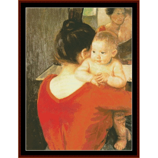 Counted Cross Stitch Pattern: Mother and Child, 1900 - Mary Cassatt- Cross Stitch Collectibles - A framed art print depicting a mother from behind holding a baby, with a warm red dress and a dark brown frame.