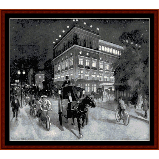 Counted Cross Stitch Pattern: New York at Night - Cross Stitch Collectibles - A framed vintage-style black and white illustration depicting a nighttime city street scene with horse-drawn carriages, cyclists, pedestrians, and illuminated buildings