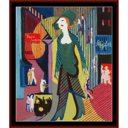 Counted Cross Stitch Pattern: Night Street by E.L. Kirchner - Cross Stitch Collectibles - A framed abstract cubist-style artwork showing a woman in a green hat and striped coat walking through a colorful city street scene. The piece includes bold blocks of blue, red, yellow, black, and purple