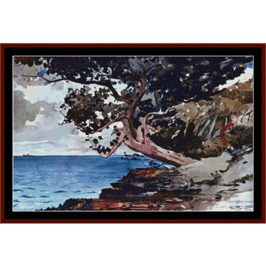 Counted Cross Stitch Pattern: North Road, Bermuda by Winslow Homer - Cross Stitch Collectibles - A framed coastal landscape painting featuring a large tree with dark foliage leaning over a rocky shoreline, with blue water and a pale sky in the background.