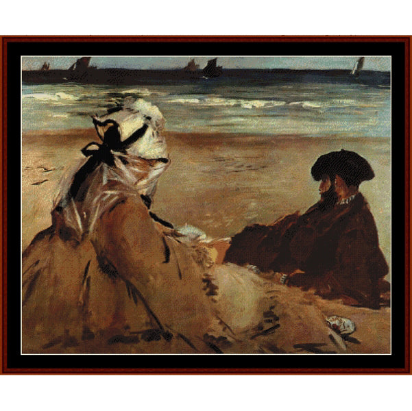 Counted Cross Stitch Pattern: On the Beach, 1873 by Edouard Manet - Cross Stitch Collectibles - A framed impressionist beach painting showing two seated figures in the foreground with the sea and distant ships under a cloudy sky.