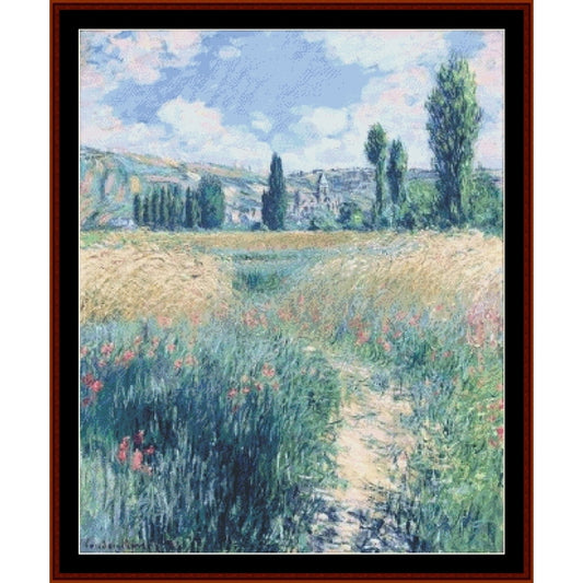 Counted Cross Stitch Pattern: Path on the Ile Saint Martin by Claude Monet - Cross Stitch Collectibles - Framed impressionist landscape painting depicting a sunlit path through a grassy field with wildflowers, trees, and distant hills under a blue sky