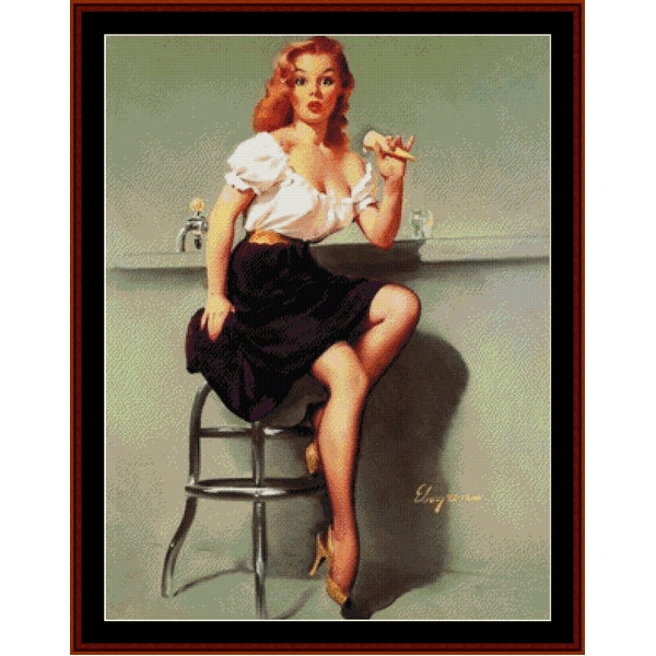 Counted Cross Stitch Pattern: Pin-Up Girl, Vintage Poster - Cross Stitch Collectibles - A framed vintage-style pin-up painting showing a seated woman with red hair in a white blouse and dark skirt, holding an ice cream cone