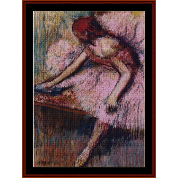 Counted Cross Stitch Pattern: Pink Dancer II by Edgar Degas - Cross Stitch Collectibles - A framed art print featuring an impressionistic painting of a woman in a pink dress leaning over a table