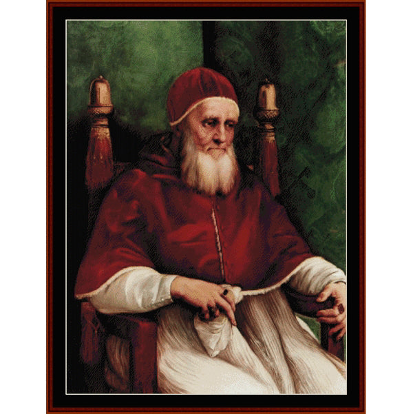 Counted Cross Stitch Pattern: Portrait of Julius II by Raphael - Cross Stitch Collectibles - A framed portrait painting of a bearded man in red and white clerical robes seated in a wooden chair against a dark green background.