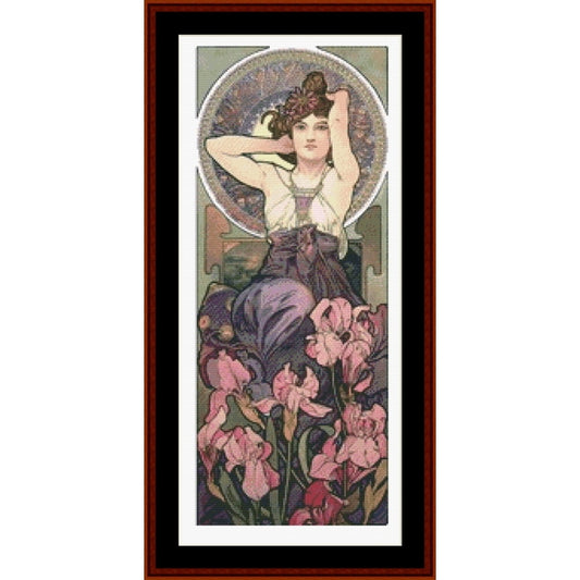 Counted Cross Stitch Pattern: Precious Stones, Amethyst by Alphonse Mucha - Cross Stitch Collectibles - A framed vertical art print featuring an Art Nouveau style illustration of a woman surrounded by pink irises