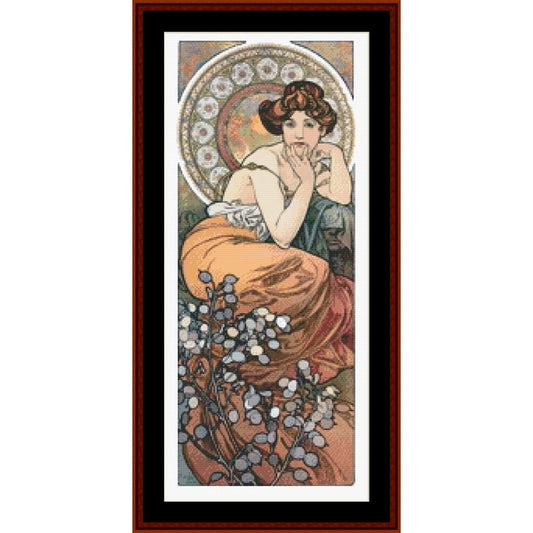 Counted Cross Stitch Pattern: Precious Stones, Topaz by Alphonse Mucha - Cross Stitch Collectibles - A framed vertical art print featuring an Art Nouveau style illustration of a seated woman with flowing orange and red drapery, blue-gray foliage, and a decorative circular motif in the background