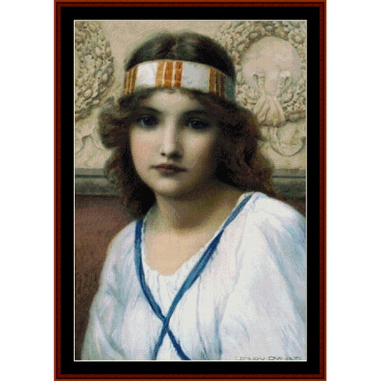 Counted Cross Stitch Pattern – Purity by Henry Ryland - Cross Stitch Collectibles - A framed vintage portrait print showing a young woman with brown hair, a white headband with orange stripes, and a white dress with blue trim, set against a decorative beige background.