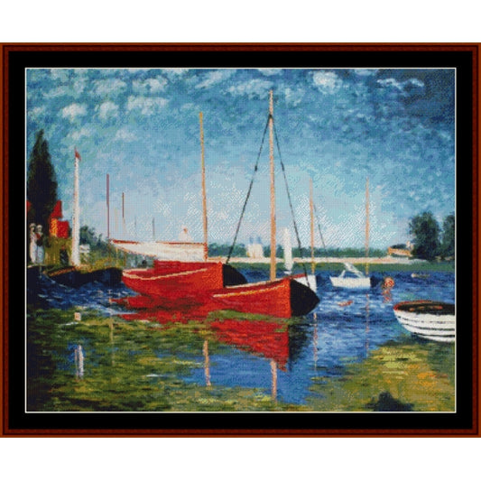 Counted Cross Stitch Pattern – Red Boats at Argenteuil by Claude Monet - Cross Stitch Collectibles - Framed impressionist-style painting of several boats moored in calm water under a blue sky, with reflections in the water 