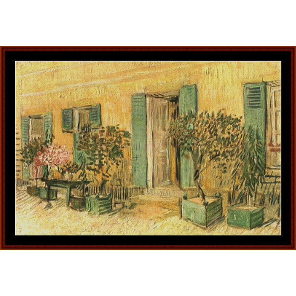 Counted Cross Stitch Pattern – Restaurant in Asnieres by Vincent Van Gogh - Cross Stitch Collectibles - A framed art print depicting a yellow-toned building facade with green shutters, potted plants, and a bench