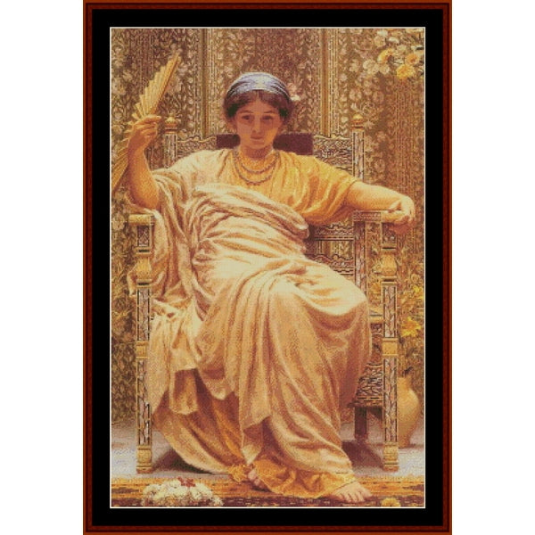 Counted Cross Stitch Pattern – Reverie by A.J. Moore - Cross Stitch Collectibles - A framed art print depicting a classical painting of a woman seated on an ornate throne, wearing flowing golden drapery and holding a fan