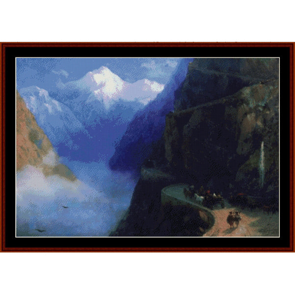 Counted Cross Stitch Pattern – Road to Gudauri, 1868 by Ivan Aivazovsky - Cross Stitch Collectibles - A framed landscape painting depicting a dramatic mountain pass with snow-capped peaks, steep rocky cliffs, and a winding road with small figures