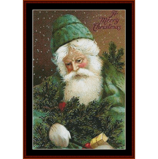 Counted Cross Stitch Pattern – Santa in Green, Christmas - Cross Stitch Collectibles - A framed vintage-style Christmas artwork showing Santa Claus with a white beard, green hat, and green pine branches, with the text 'Merry Christmas' in the upper right.