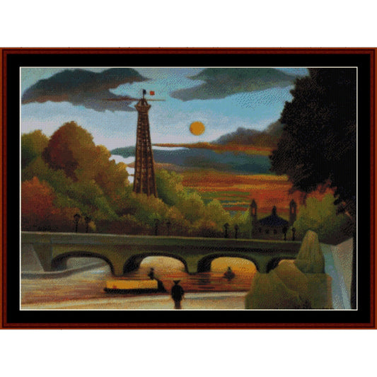 Counted Cross Stitch Pattern – Seine & Eiffel Tower in Sunsetby Henry Rousseau - Cross Stitch Collectibles - A framed landscape art print depicting a scenic river crossing with a tall tower, stone bridge, trees, and a sunset sky with a yellow sun.