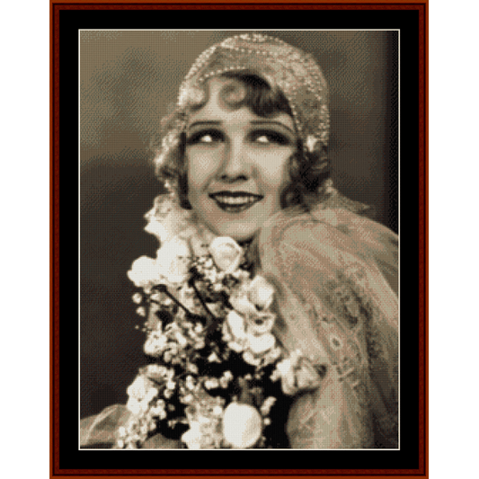 Vintage-style Counted Cross Stitch Pattern by Cross Stitch Collectibles of a woman holding flowers